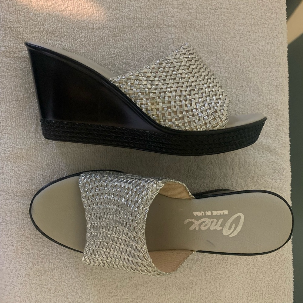 Onex wedge sandal. Silver with black wedge, size 8. Never worn. See pictures.